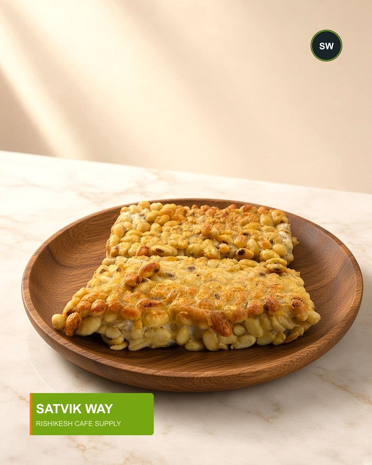Cooked Satvik Way tempeh on wood plate — Satvik Way tempeh, Rishikesh cafe supply